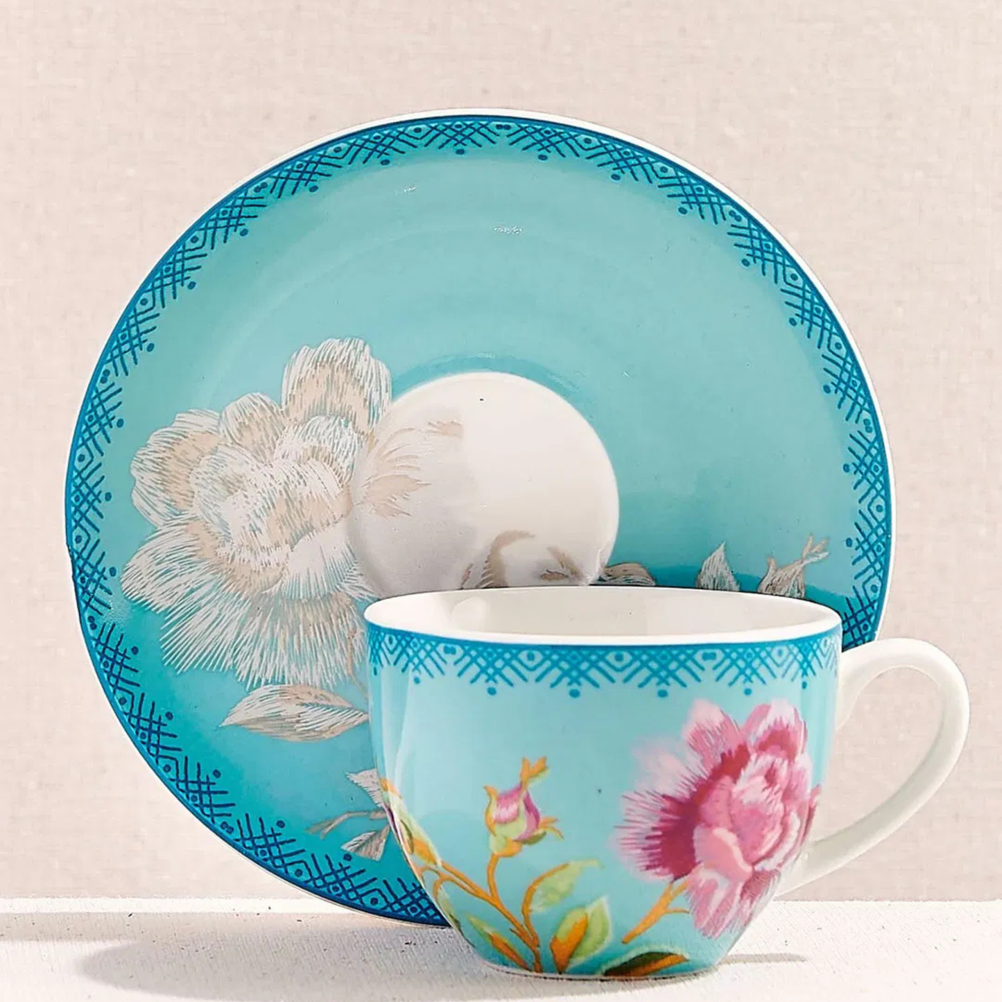Azure Bloom Porcelain Cup & Saucer Set – Turquoise Floral Design